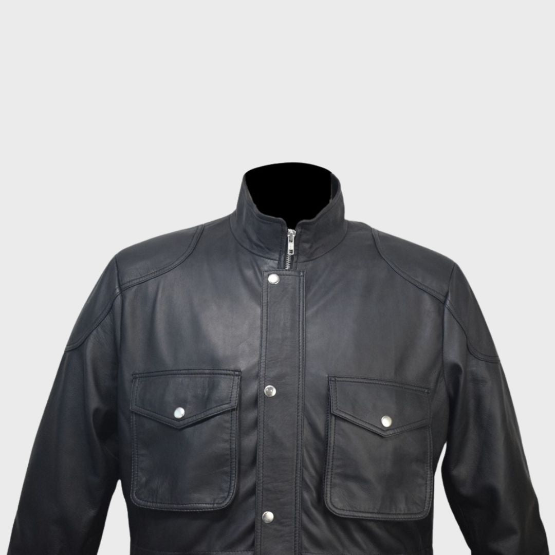 Close-up of the flap pockets on a black leather police jacket for men.