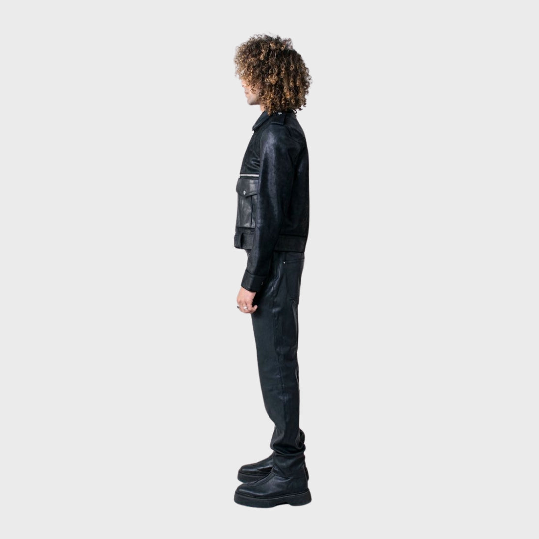 Curly hair blonde boy wearing black leather biker jacket w/ black leather boots