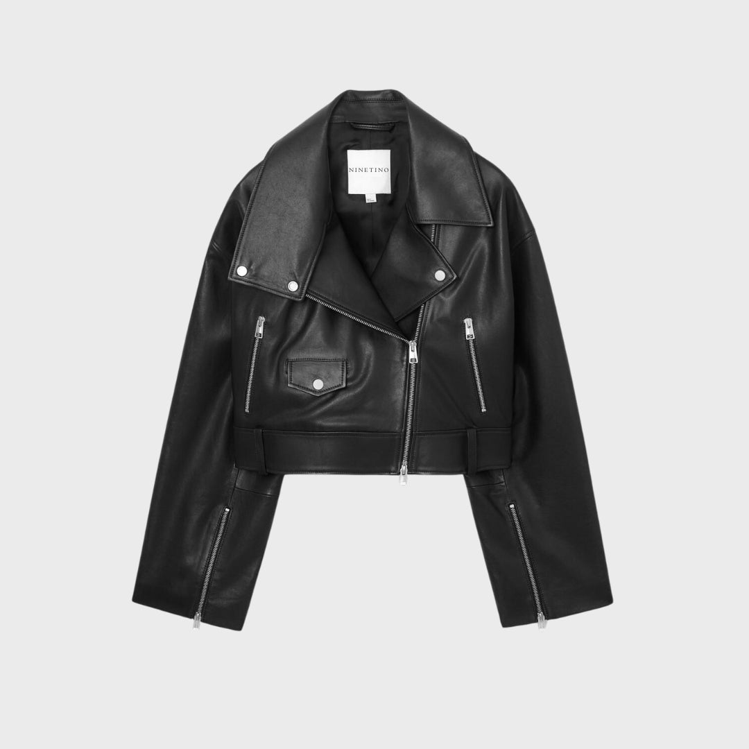 100% Lambskin moto biker jacket with zipper pockets, wide waist belt, notched collar, zipper cuffs and polyester lining