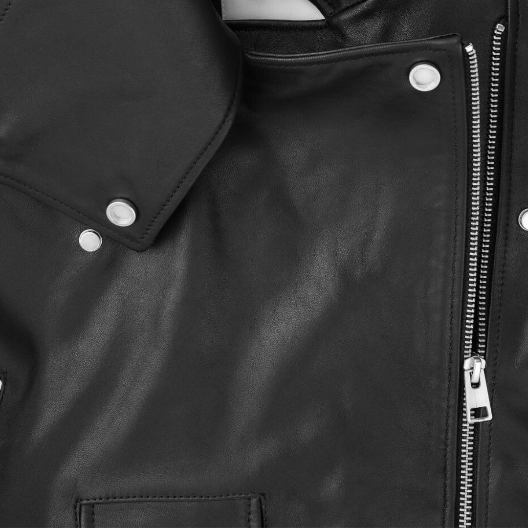 Notched collar with full front zipper fastening on black leather biker jacket