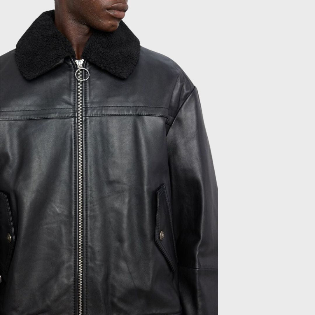 Black leather bomber jacket with detachable fur