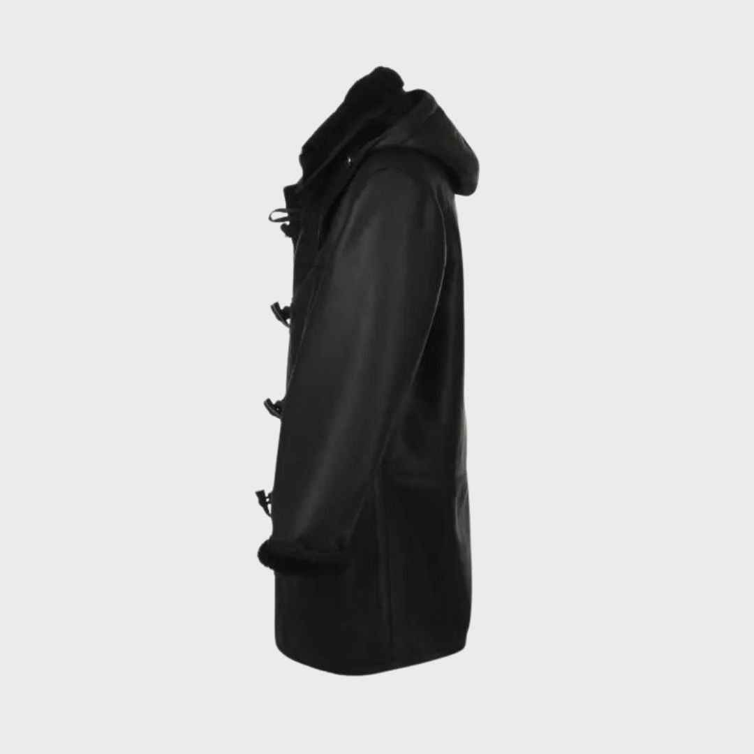 Side angle of Real lambskin black leather fur coat with fur lining, pockets and detachable hood